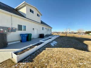 View of the north side of the home & garden boxes