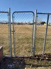 Gate from the backyard to the elementary school property