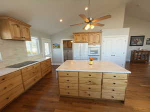 Lots of cabinets for storage in the open kitchen