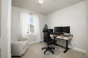 View of carpeted home office