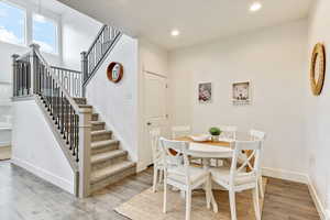 Dining room with wood-type flooring