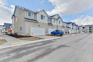 Exterior space featuring a garage and central AC