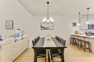 Dining area with light wood-type flooring