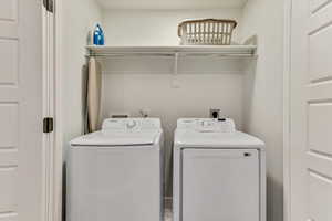 Clothes washing area with washing machine and clothes dryer