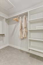 Walk in closet with carpet