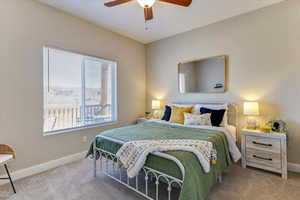 Bedroom featuring carpet floors and ceiling fan