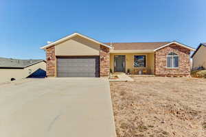 Ranch-style home with a garage