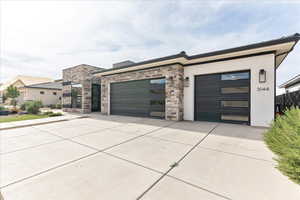 View of front of property with a garage