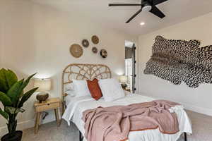 Bedroom with carpet and ceiling fan