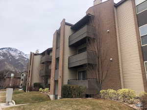 View of building exterior featuring a mountain view