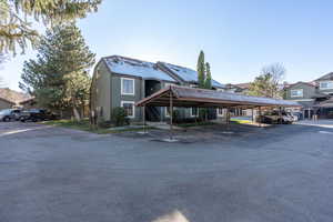 View of front of home featuring a carport