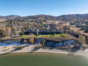 Bird's eye view featuring a water and mountain view