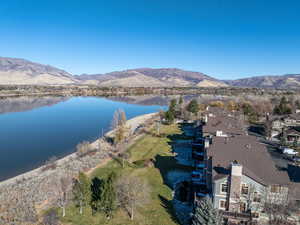 Aerial view featuring a water and mountain view