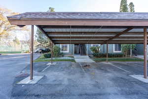 View of car parking with a carport