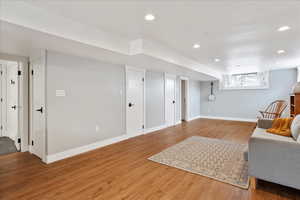 Living area featuring hardwood / wood-style flooring