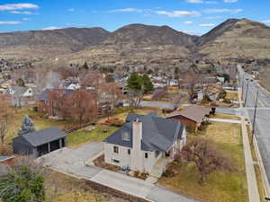 Birds eye view of property with a mountain view