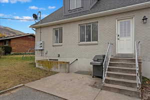 Rear view of house with a patio