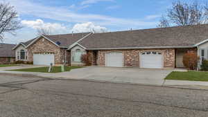 Single story home featuring a garage