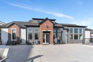 Rear view of property featuring a patio