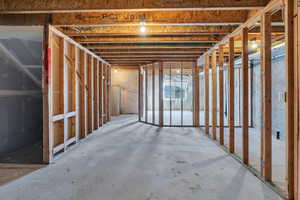 Miscellaneous room featuring concrete flooring