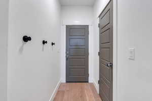 Hall featuring light hardwood / wood-style floors