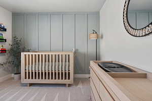 Carpeted bedroom featuring a textured ceiling