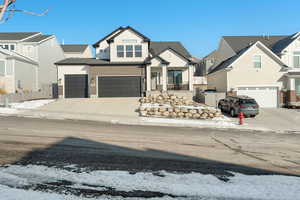 View of front of property with a garage