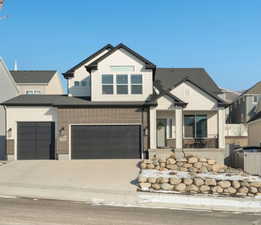 View of craftsman inspired home