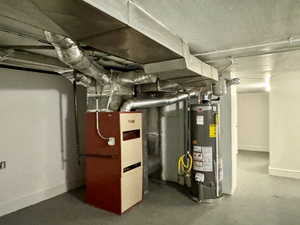 Utility room with heating unit and water heater