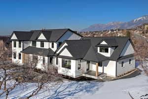 View of front of house with a mountain view