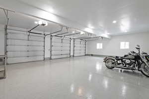 Garage featuring a garage door opener