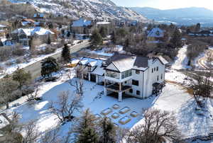 Snowy aerial view with a mountain view