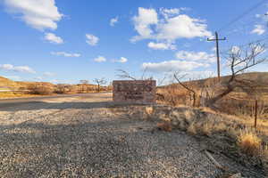 View of yard with a rural view