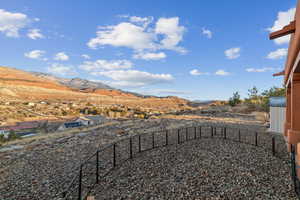 View of yard with a mountain view