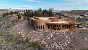 Exterior space featuring a mountain view and a patio