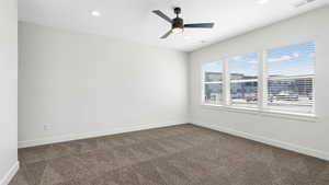 Primary bedroom with en suite bathroom and walk in closet