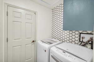 Laundry area with separate washer and dryer