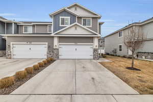 View of front of home with a garage