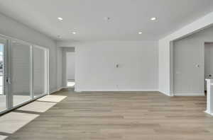 Empty room featuring light hardwood / wood-style floors