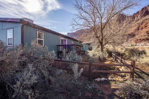 View of home's exterior with a deck