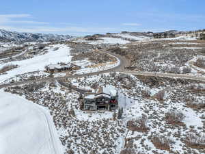 Snowy aerial view with a mountain view