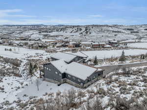 Snowy aerial view with a mountain view