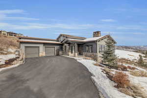 View of front of home with a garage