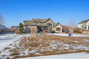 View of snow covered property