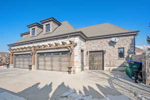 View of front of property featuring a garage