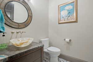 Bathroom with vanity and toilet