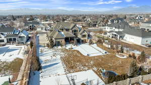 Snowy aerial view with a mountain view