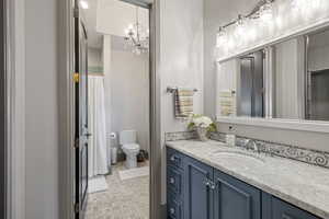 Bathroom with vanity and toilet