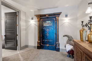 View of carpeted foyer