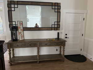 Foyer featuring wood-type flooring